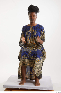 Dina Moses  1 dressed sitting traditional decora long african…